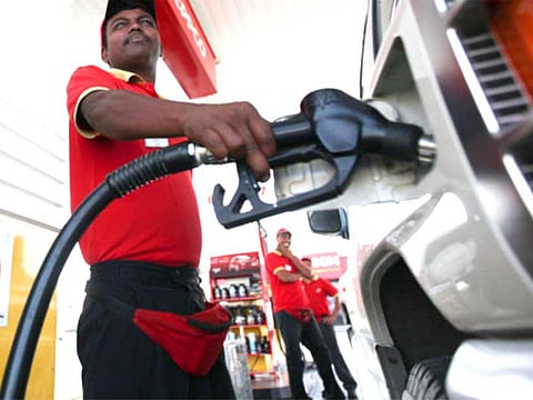 A petrol pump attendant at an Eppco filling station.