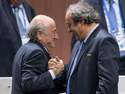 Michel Platini (right) with former Fifa president Sepp Blatter, both of whom are being subjected to a probe at the Swiss court.