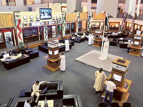 File photo: Traders at the Dubai Financial Market.