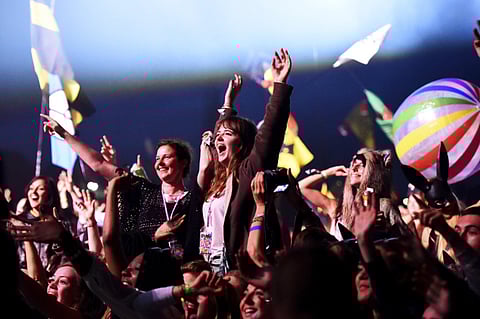 Revellers dance at the Glastonbury Festival in a file photo.