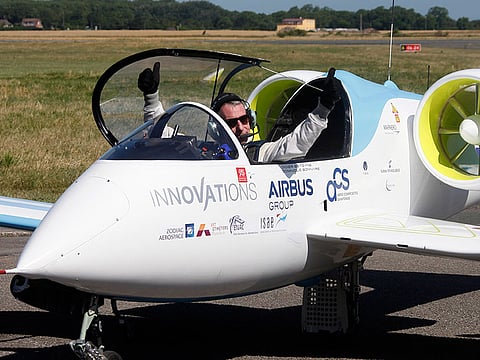 French pilot Didier Esteyne, left, thumbs up after crossing the Channel with his Airbus E-Fan prototype. Airbus flew its electric plane across the English Channel for the first time Friday, hours after a French pilot made a similar voyage in his electric plane — journeys seen as a symbolically important step toward making electronic flight viable in the long term.