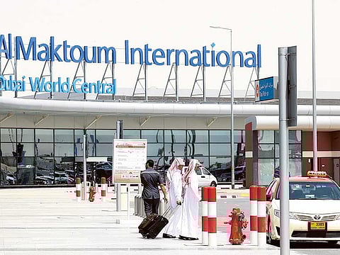 Passengers arriving at the Al Maktoum International Airport .