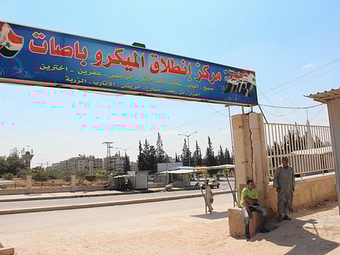 Aleppo bus depot is bridge between 2 worlds