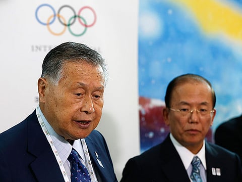 Tokyo 2020 Olympics CEO Toshiro Muto (right) with Yoshiro Mori, president of the organising committee.