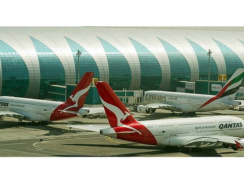 Qantas and Emirates airlines at Dubai International Airport. Cash generation in Airline industry is now in sight, but it might not arrive before the end of this year, said Brian Pearce, Chief Economist of the International Air Transport Association (IATA).