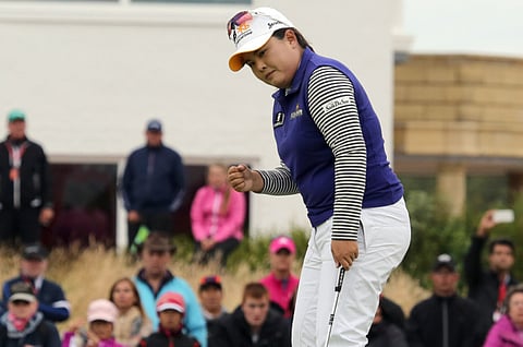 South Korea’s Park In-bee reacts on the 18th green during
her final round 65, on day four of the Women’s British Open
Golf Championships in Turnberry, Scotland, on Sunday.