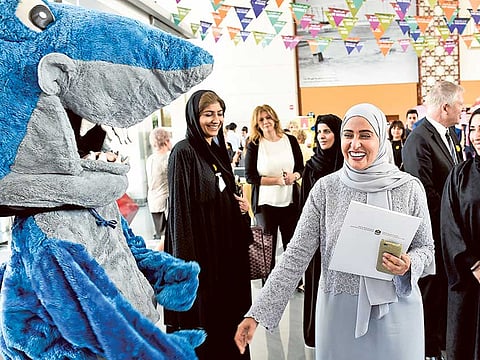 Uhoud Khalfan Al Roumi tours an exhibition in Dubai.