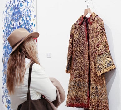 Jawaher’s coat fetches Dh440,000 in auction