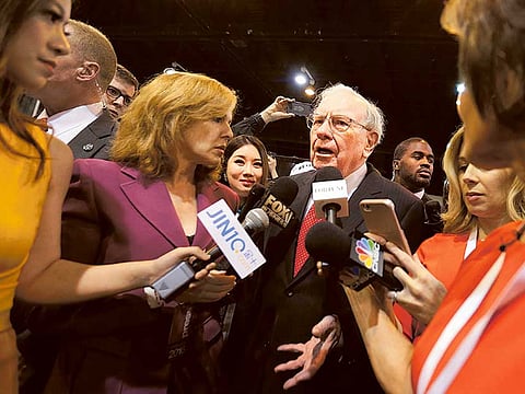 Berkshire Hathaway Chairman and CEO Warren Buffett speaking to reporters. The crisis has spooked America's forever optimist so much so that he's fled the airline industry entirely, and now even certain automobile and banking stocks, according to a regulatory filing.