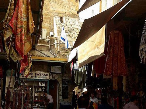 Israel plants flag on holiest Christian site