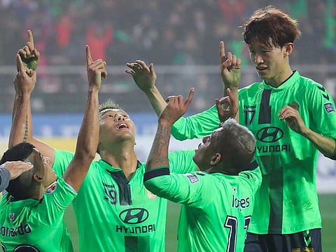 Jeonbuk Hyundai Motors, defending champions of South Korea's K-League, will feature in the opening match of the season delayed by the coronavirus epidemic.