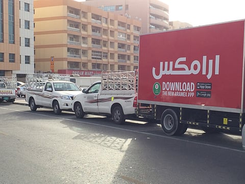 Parking spots occupied by commercial vehicles in Bur Dubai