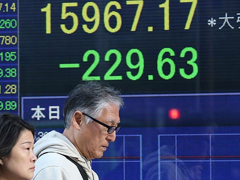 The BOJ left its interest rates and asset purchases unchanged and downgraded its assessment of the economy, citing the impact of COVID-19.