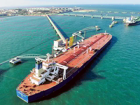 A crude oil importing port in Qingdao, Shandong province, China. The IEA says oil supply may still exceed demand throughout the whole of 2016.