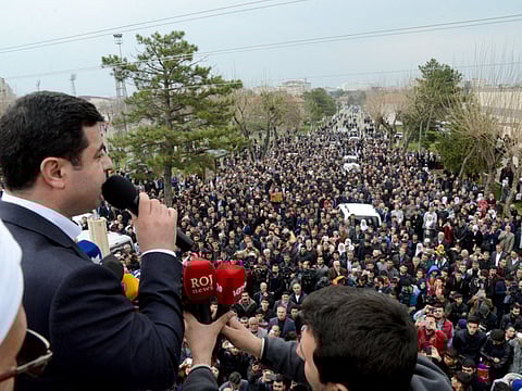 In this file picture, chairman of the pro-Kurdish opposition party HDP of Turkey, Selahattin Demirtas speaks as Kurds gather after Friday prayer in Diyarbakir, southeastern Turkey, on March 4, 2016.
