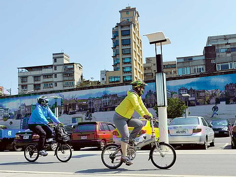 Cyclists ride on a bike path in Taipei. Photo for illustrative purposes only.