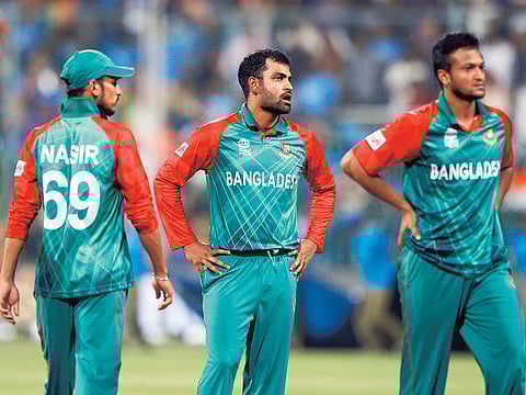 Bangladesh Cricket Board president Nazmul Hasan has questioned the role of veterans Tamim Iqbal (centre) and Shakib Al Hasan (right) in the ongoing crisis.
