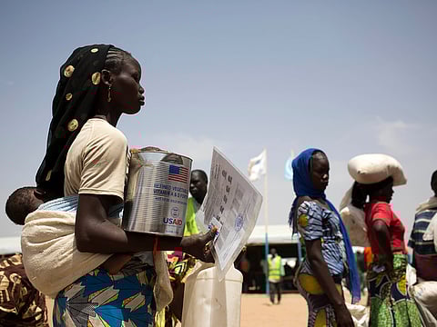 File photo: Nigerian refugees receive food aid at the Minawao refugee camp in northern Cameroon.