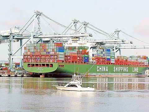 China Shipping containers are unloaded in Los Angeles. Chinese shipping company COSCO said it plans to launch regular services through the Arctic Ocean.