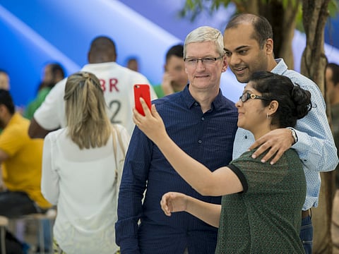 Apple CEO Tim Cook shakes hand, takes selfie in surprise visit to Dubai