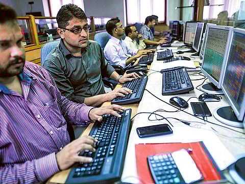 A brokerage in Mumbai. India’s market regulator, Sebi has allowed some categories of debt mutual funds to invest more in government bonds and treasury bills.