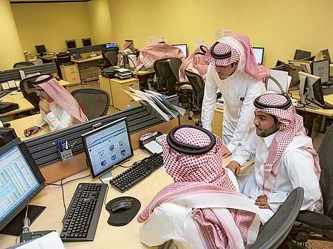 Stock traders in Riyadh. Aramco shares extended declines Monday after dropping to its lowest closing price yet a day earlier, as the U.S. killing of Iran’s most prominent general last week triggered fresh concern of a wider conflict in the Gulf region.
