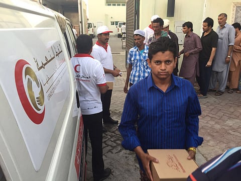 Picture for illustrative purposes: meal handouts must be done in conjunction with authorities this Ramadan