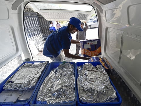 Workers at a kitchen in Sharjah get ready with food distribution for Iftar, earlier. Picture for illustrative purposes only.
