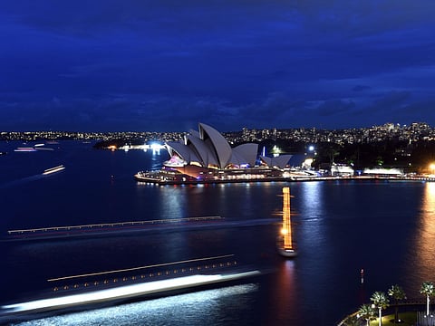 The predator struck Monday evening as the woman swam off a wharf at Elizabeth Bay, less than two kilometres (1.2 miles) from Sydney Opera House.