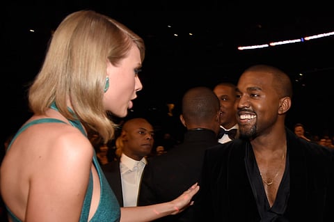 Taylor Swift and Kanye West attend The 57th Annual GRAMMY Awards at STAPLES Center on February 8, 2015.