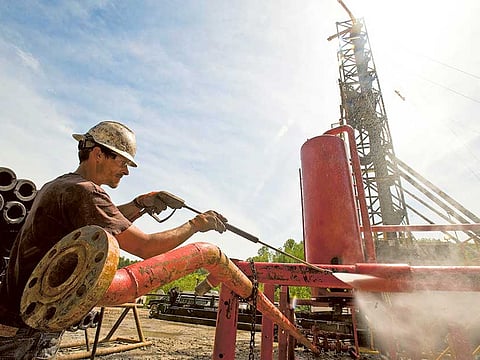 A shale-gas well in Mannington, West Virginia. Oil prices fell on Wednesday after an industry report showed an unexpected build-up in US oil inventories last week.