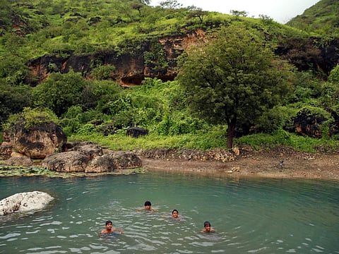 Planning a road trip from the UAE to Oman this summer? Learn everything you need to know about visa-on-arrival eligibility, required documents, car insurance options, border crossing tips, and costs to ensure a smooth and stress-free journey. (A water spring in Salalah, Dhofar province, Oman)
