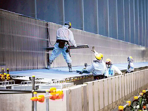 File picture: Workers at the Fukushima Daiichi Nuclear Power Station.