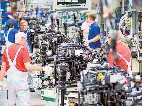 The assembly line in the Volkswagen factory in Wolfsburg, Germany. The plant is is struggling to meet strong demand for the Golf model due to shortages of battery cells for hybrid versions and semiconductor components.