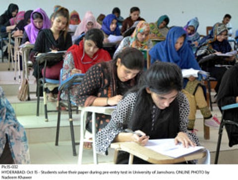 Students appear for a pre-entry test. Pakistani private schools, charitable institutions, and religious seminaries are stepping in to supplement government-run schools in imparting education.