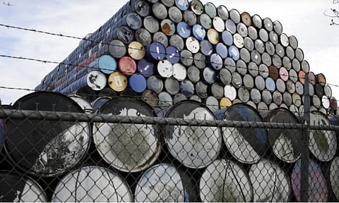 Global oil demand has taken a hit from COVID-19, but demand is very much there once activities start in earnest. File picture of used oil barrels at a storage facility in Seattle.