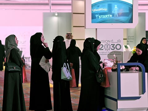 Saudi women apply for a job during a job fair in 2017. On Sunday, it was announced that the unemployment rate for citizen fell to the lowest in more than three years