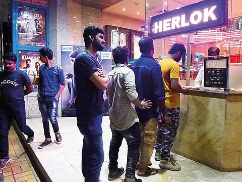 People are seen queuing for the tickets at Eldorado Cinema in Abu Dhabi.