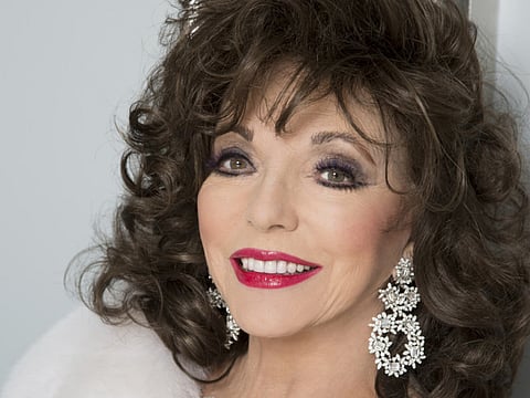 Joan Collins slams son for claims about her ex