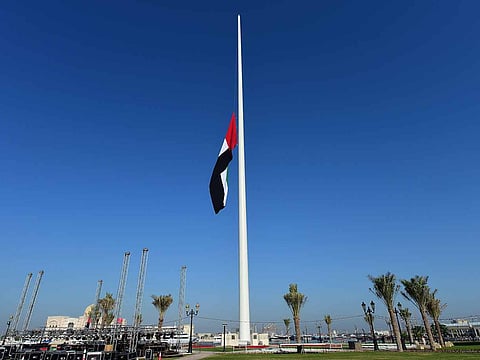 UAE flag at half-mast in Sharjah Flag Island. For illustrative purposes only.
