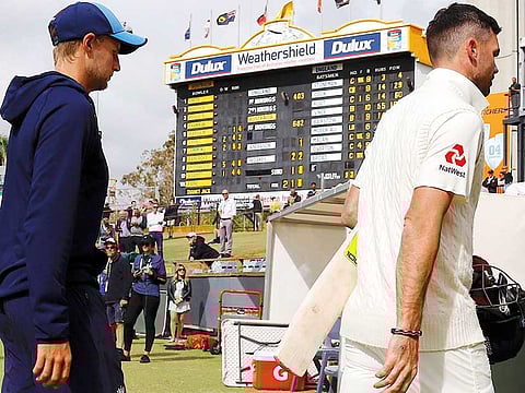 England's captain Joe Root (left) and James Anderson are clearly not on the same page about how to go forward to seek a turnaround in the Ashes series.
