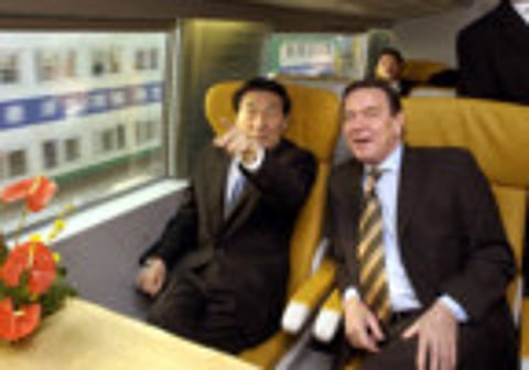 December 31, 2002: Zhu, Schroeder open ‘maglev’ train line
