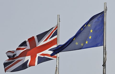 The Union Jack's flying high for now... The economy has had two strong months in June and July, but businesses will feel the pinch from government support winding down. That could trigger heavy job losses.