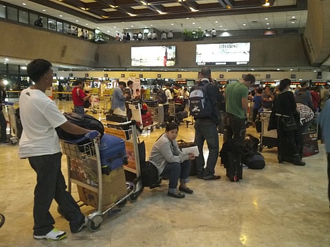 Filipinos laud airport terminal fee waiver in Manila