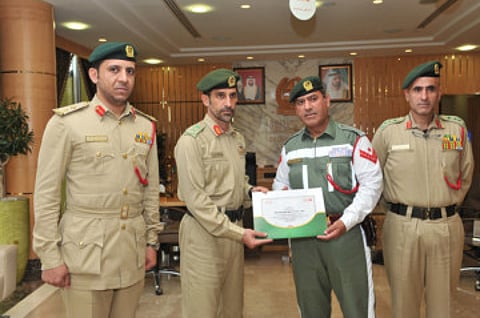 Policeman who directed traffic during rain honoured