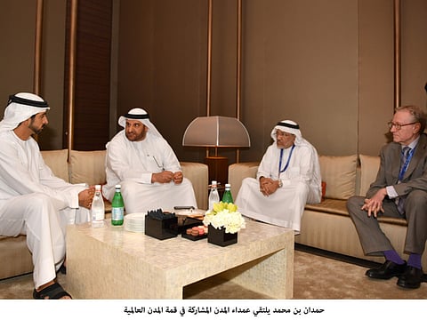 Hamdan receives World Cities Summit dignitaries