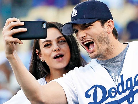 Ashton Kutcher and wife Mila Kunis