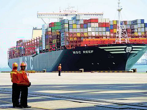 A container ship at Qingdao, east China. Maritime container freight shipping is steaming ahead through the Covid-19 pandemic, boosted by strong demand for Chinese exports and a shortage of vessels.