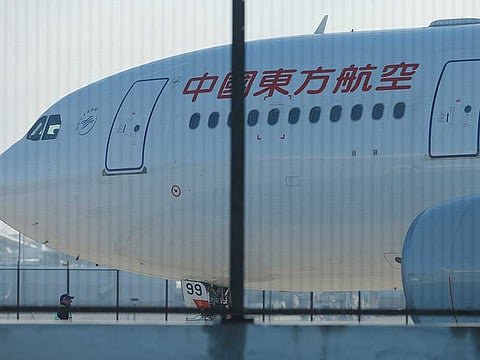 A China Eastern Airlines Airbus A330 aircraft on the tarmac at Sydney International Airport in Australia.
