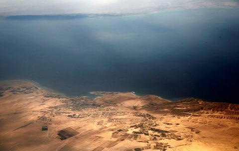 An aerial view of the coast of the Red Sea and the two islands of Tiran and Sanafir is pictured through the window of an airplane near Sharm el-Sheikh, Egypt November 1, 2016.